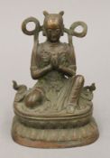 A patinated bronze model of Buddha. 16 cm high.