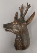 A Blackforest wooden roe deer's head. 27 cm high.