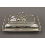 A silver entree dish. 26 cm long. 31.4 troy ounces.