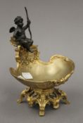 A gilt bronze cherub salt. 19 cm high.