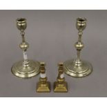A pair of 19th century solid brass Polish candlesticks, stamped Norblin and Co Warszawa,