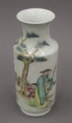 A Chinese porcelain vase decorated with figures. 24 cm high.