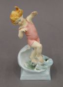 A Royal Worcester porcelain figure modelled by Freda Doughty, entitled 'July'. 17 cm high.