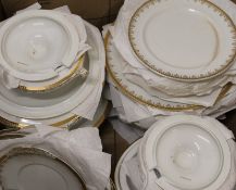 A quantity of Victorian gilt decorated porcelain dinnerwares