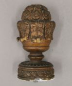 An 18th century carved oak finial. 16.5 cm high.