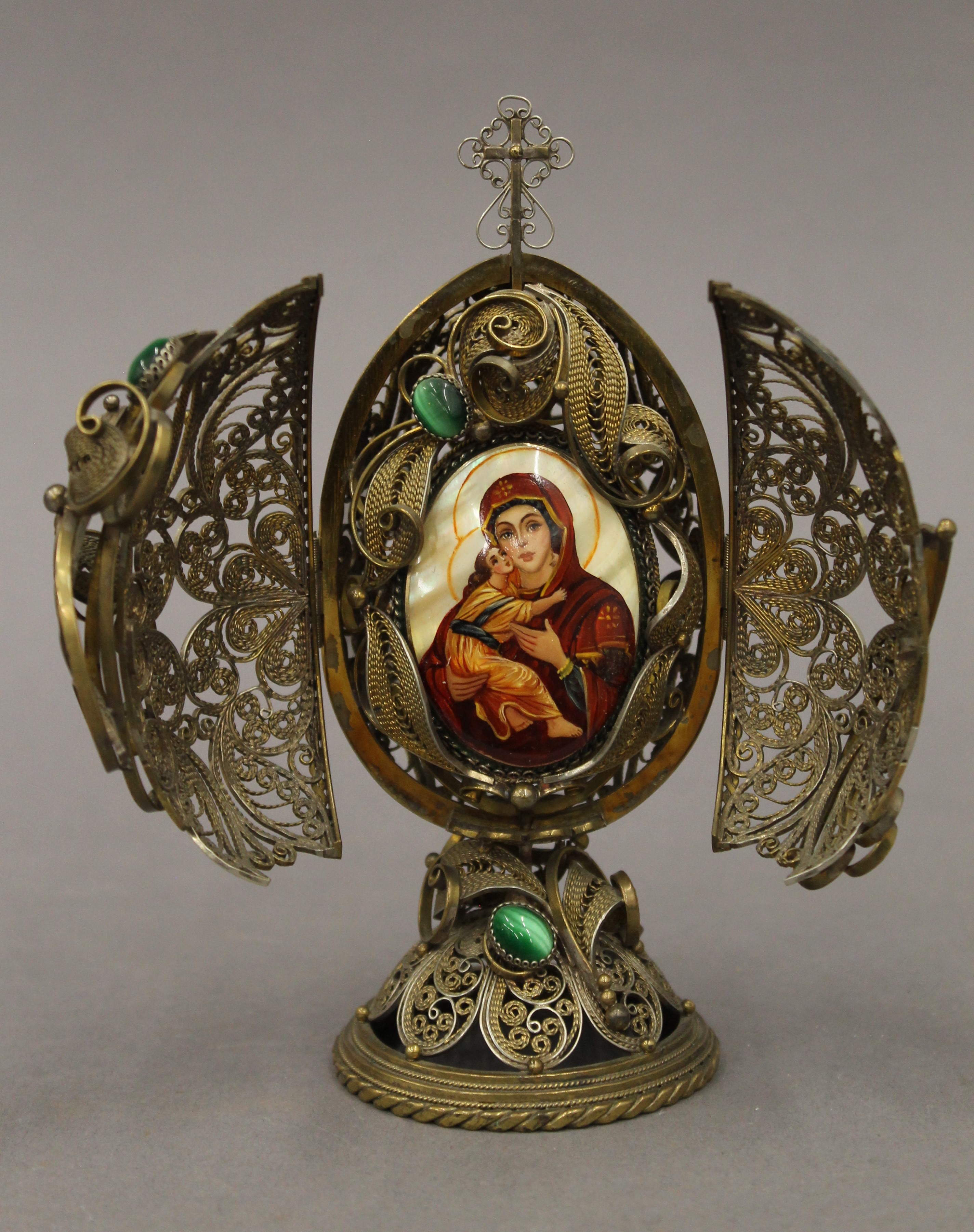 A silver gilt filigree egg enclosing an icon, bearing Russian marks. 15 cm high. - Image 2 of 2