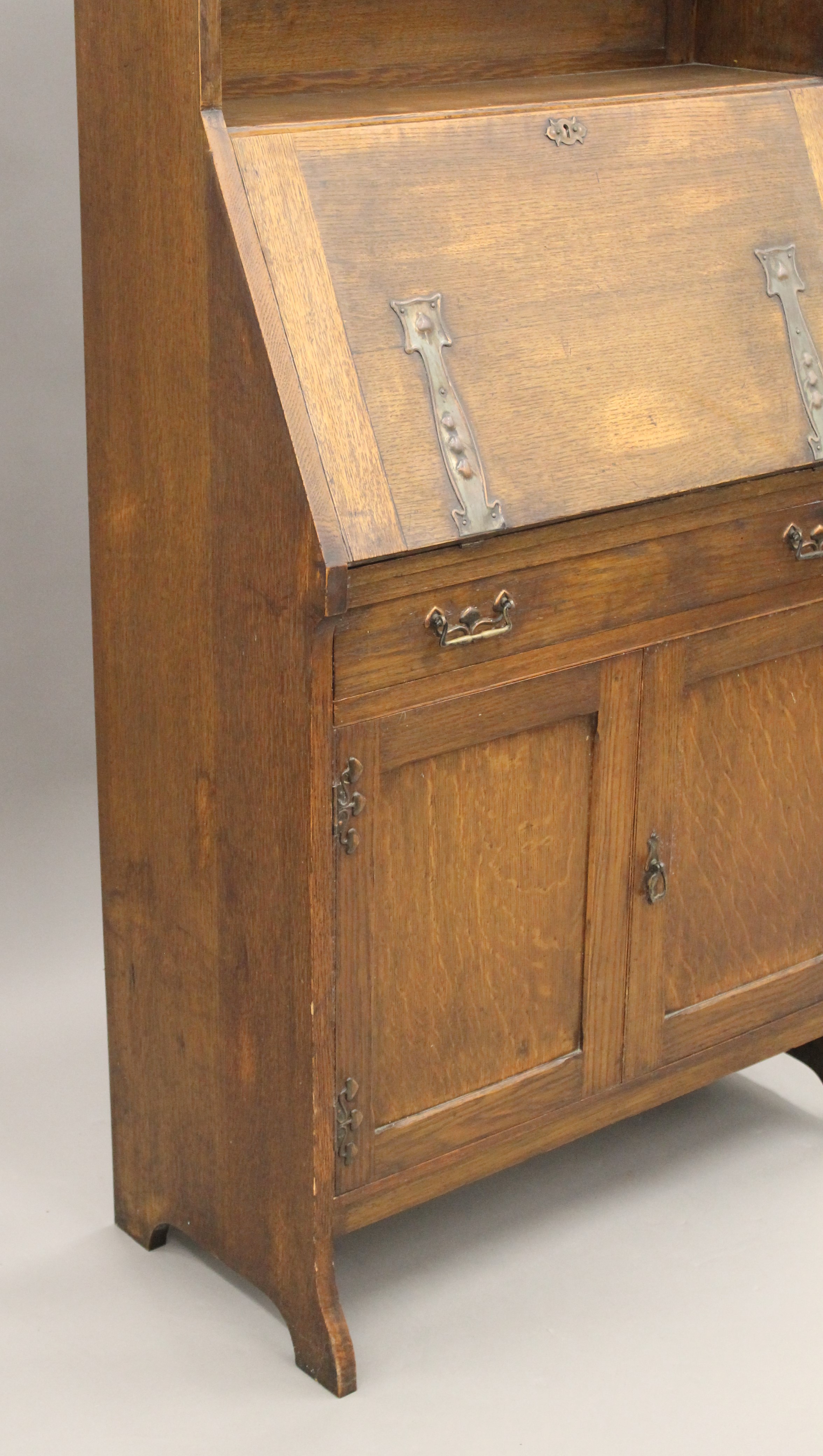 An Arts and Crafts oak hall bureau bookcase. 76 cm wide. - Image 4 of 11