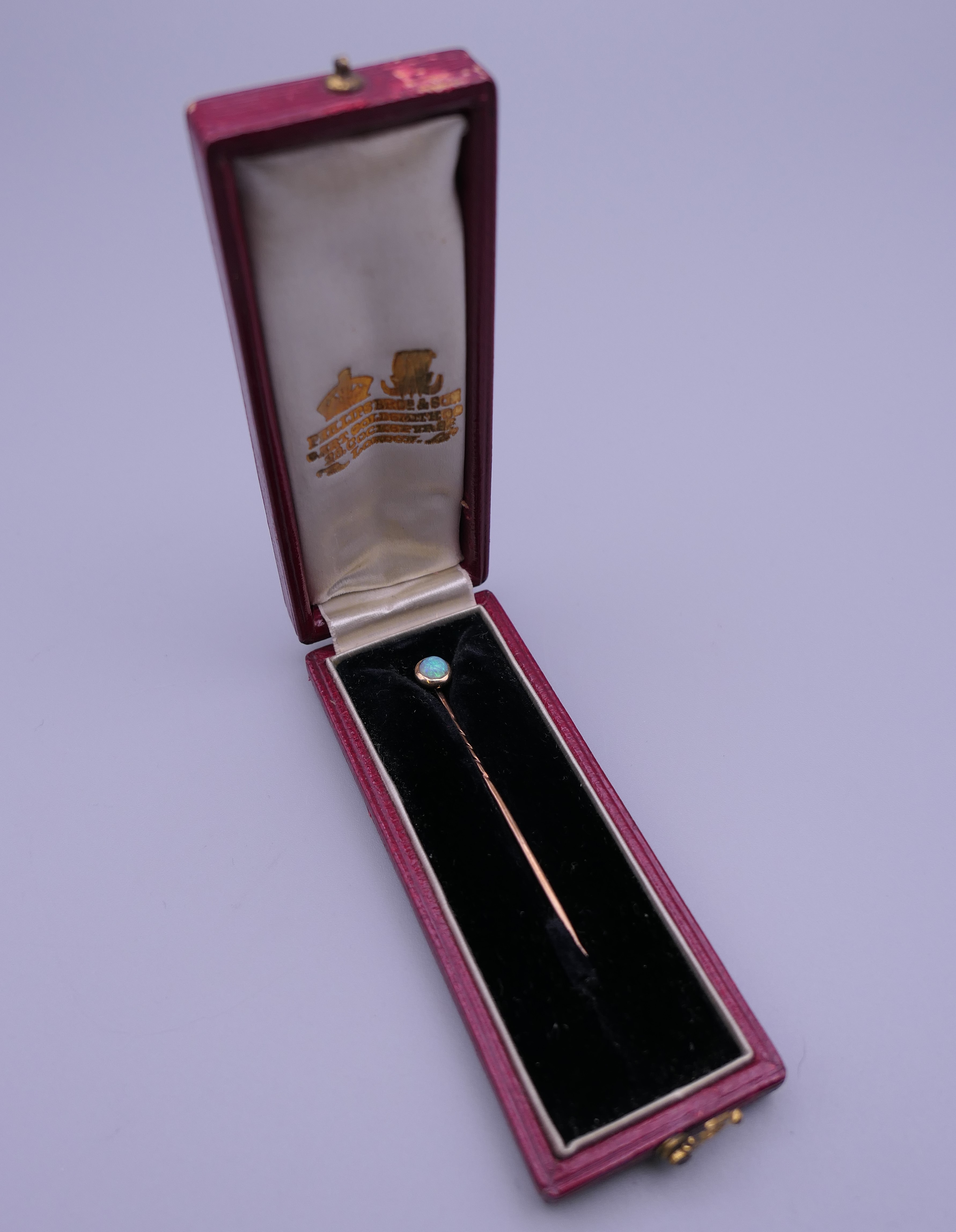 An opal mounted unmarked stickpin, housed in a leather box. 5.5 cm long. - Image 6 of 9