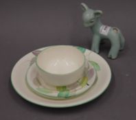 Four pieces of Grays pottery and a pottery lamb. The latter 12.5 cm high.