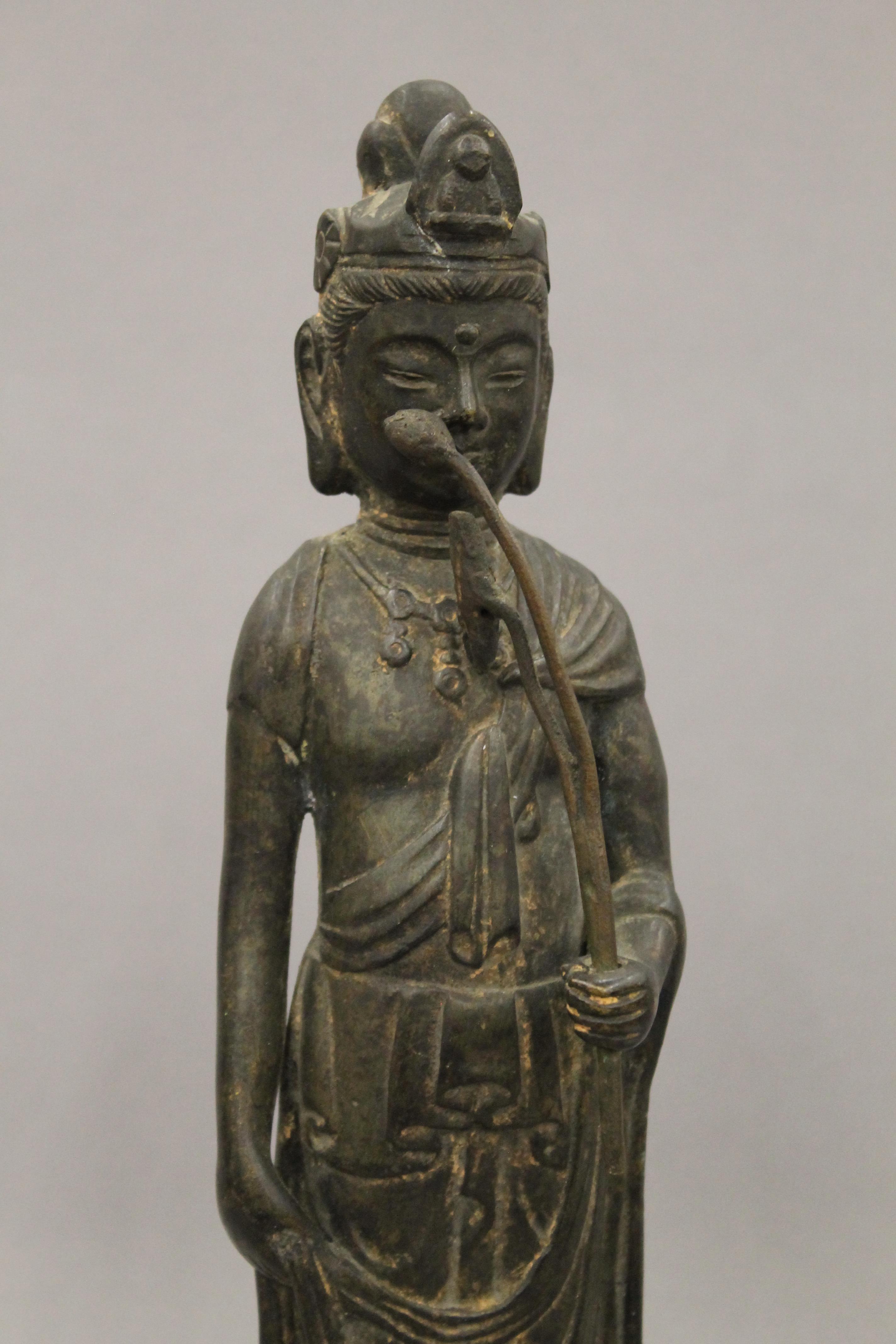 A pair of Chinese patinated bronze models of Guanyin. Each 32 cm high. - Image 9 of 13