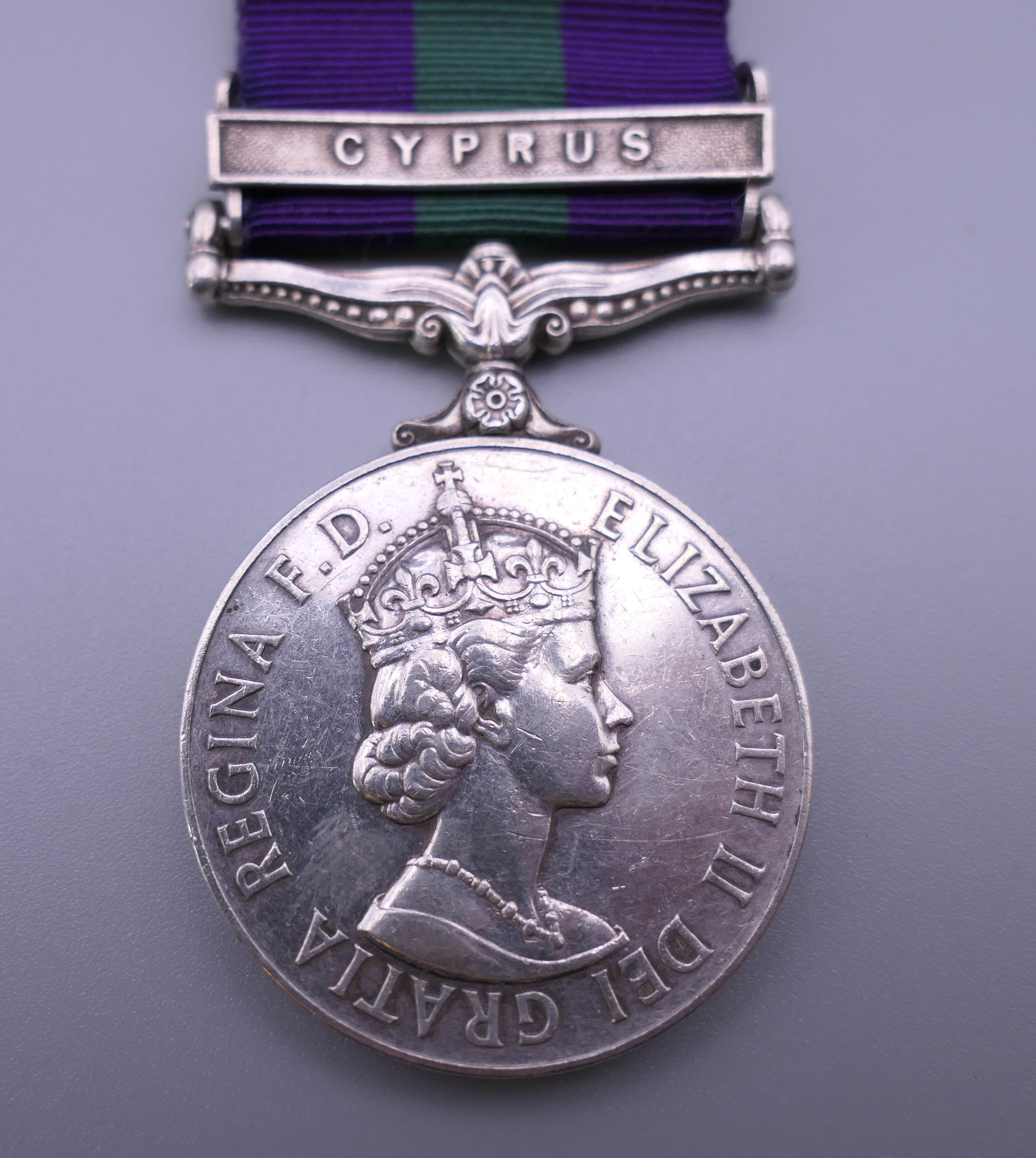 A British Military Elizabeth II General Service medal with Cyprus bar awarded to 23490098 GNR F - Image 2 of 5