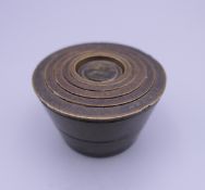 A set of six 18th century English bronze bucket weights.