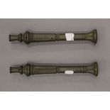 A pair of small-scale cast bronze models of canons,