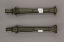 A pair of small-scale cast bronze models of canons,