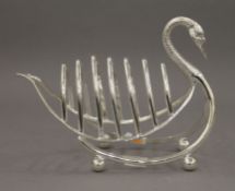 A silver plate swan formed toast rack. 22 cm long.