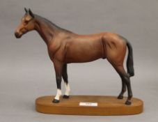 A Royal Doulton collectors racehorse. 22 cm high.