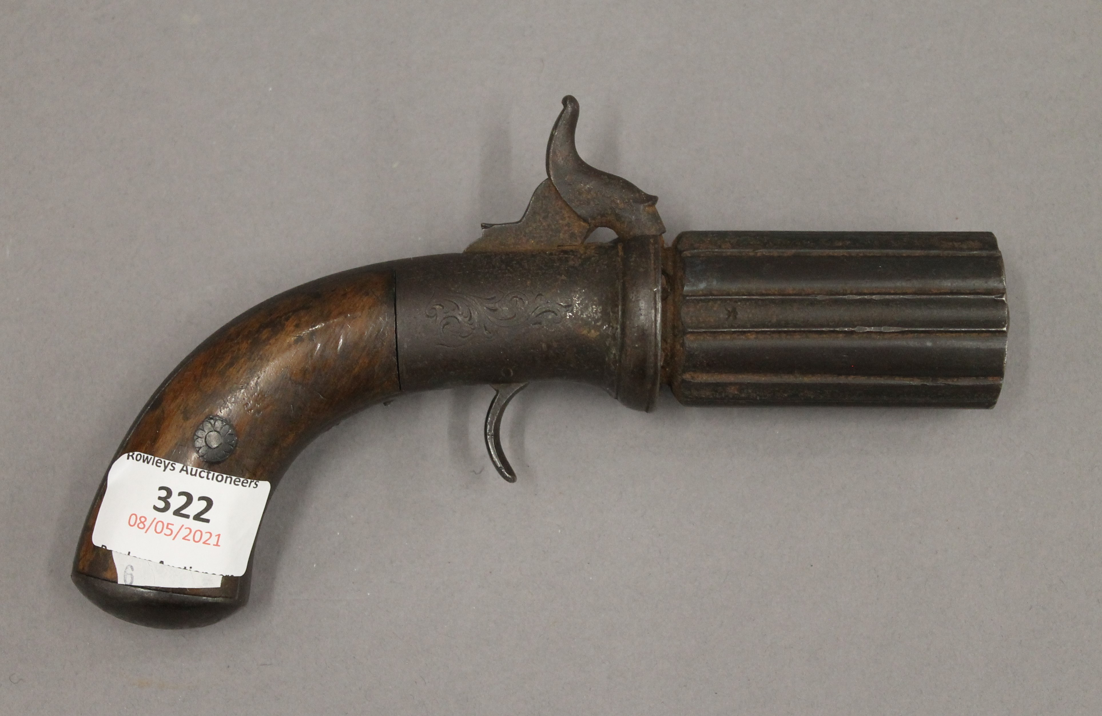 A 19th century pepper box pistol. 19.5 cm long.