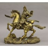 A Japanese bronze model of a warrior on horseback. 25 cm long.