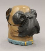 A bronze pug dog inkwell. 8.5 cm high.