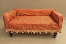 A Victorian upholstered child's settee. 101 cm wide, 53 cm deep, 48 cm high.