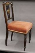 A Victorian inlaid rosewood side chair.