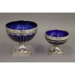 Two blue glass lined old Sheffield plate tazzas. The largest 11.5 cm high.