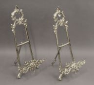 A pair of plated table easels. 40.5 cm high.