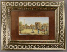 An early 20th century Persian miniature on ivory, framed and glazed. 17 x 13 cm overall.