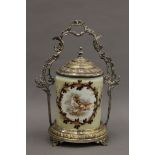 A Victorian silver plate and milk glass biscuit barrel decorated with cherubs. 29 cm high overall.