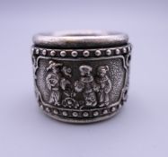 A silver archer's ring. 2.25 cm high.