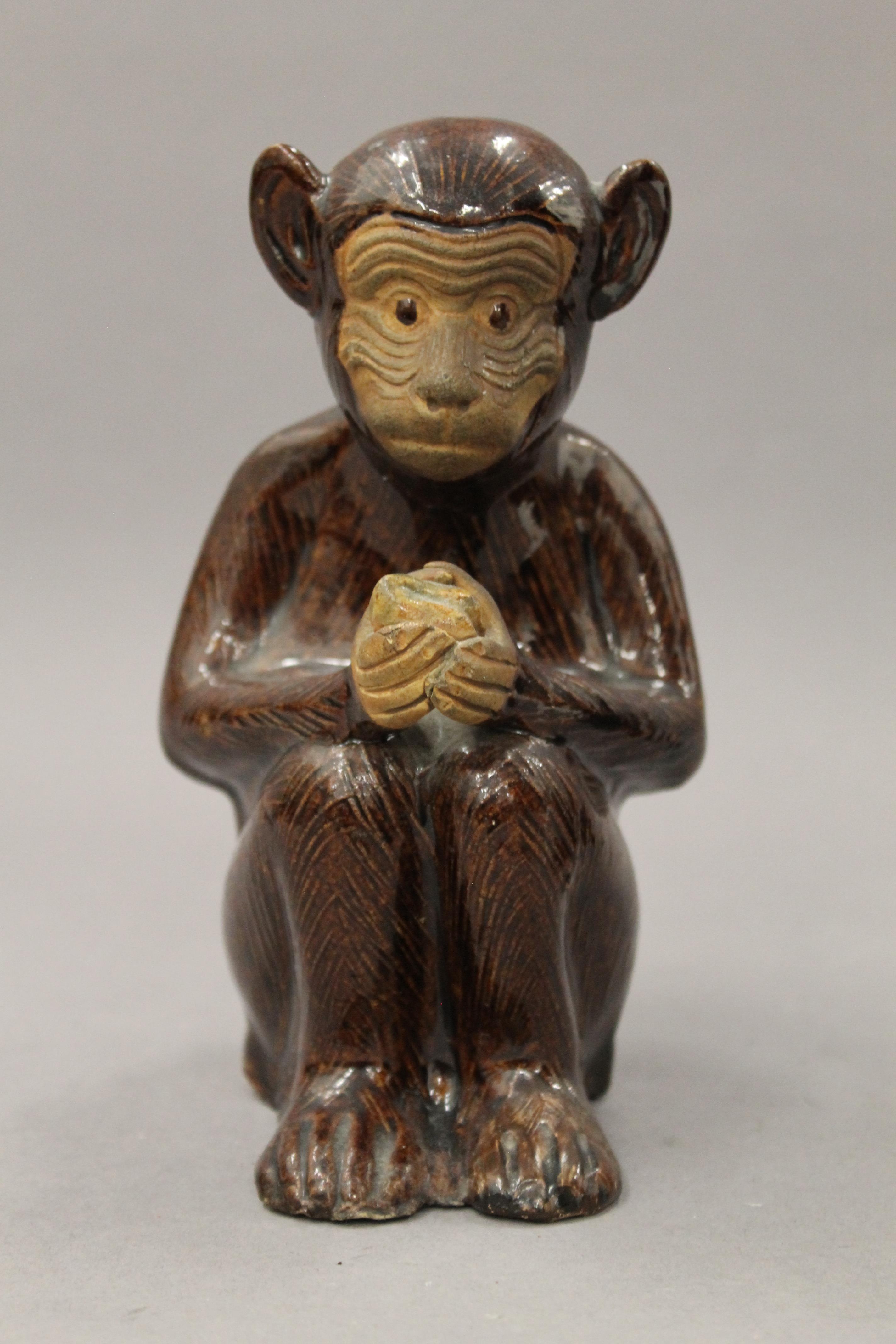 A pair of pottery censers formed as monkeys. Each 15 cm high. - Image 3 of 5