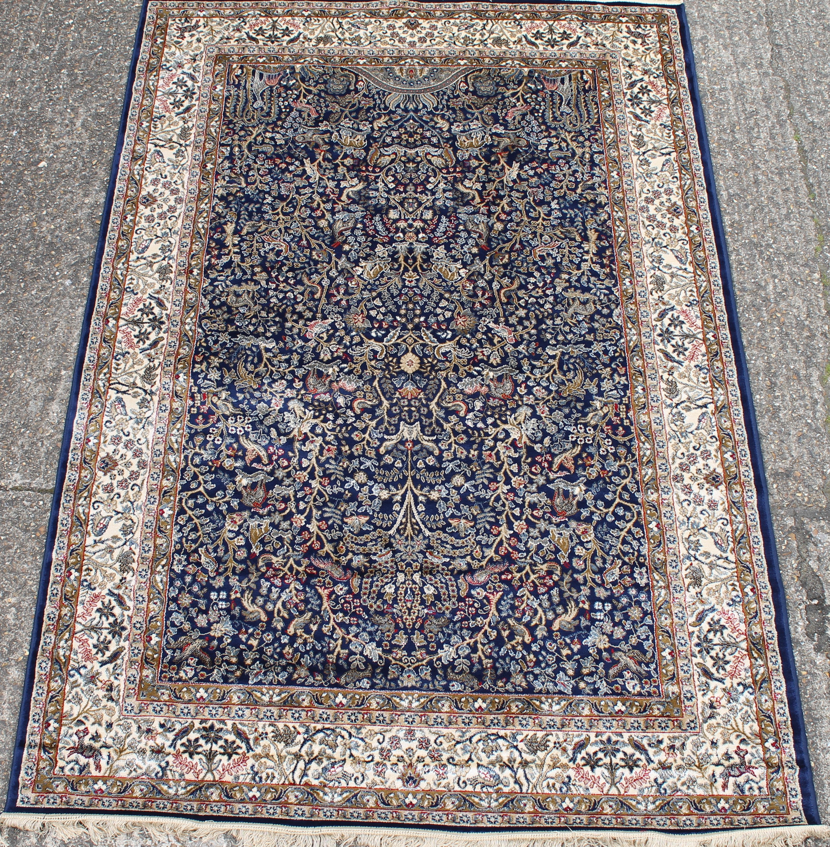 A deep blue ground full pile Kashmir tree of life rug. 240 x 160 cm.