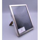 A silver box frame. 11 x 15 cm.