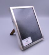 A silver box frame. 11 x 15 cm.