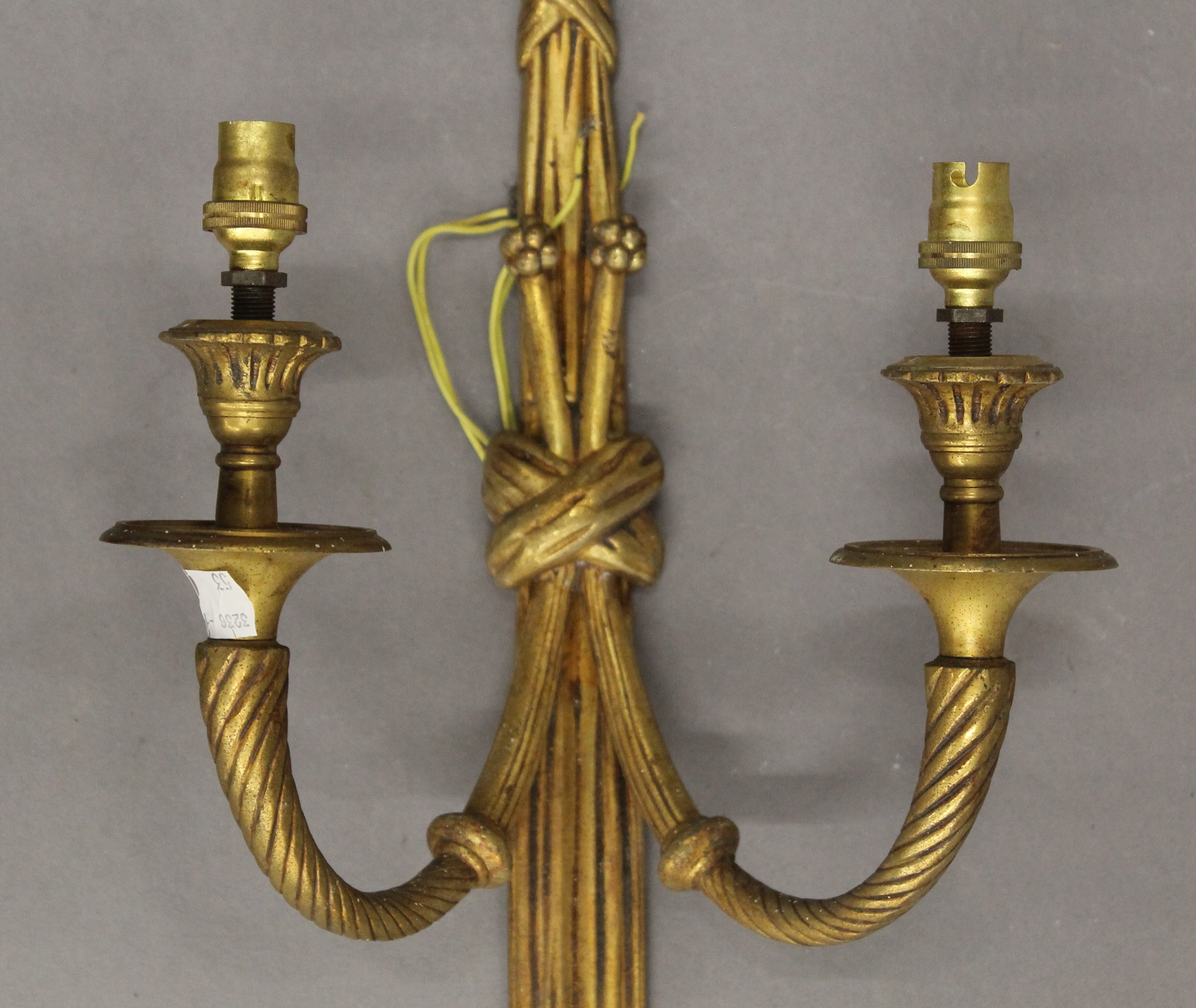 A pair of gilt brass twin branch wall lights. 64 cm high. - Image 4 of 4