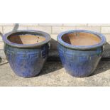 Two blue glazed pottery garden planters.