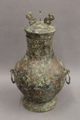 A Chinese bronze archaic style lidded vase. 34 cm high.