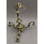 A brass chandelier. 49 cm high.