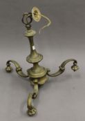 A brass chandelier. 49 cm high.