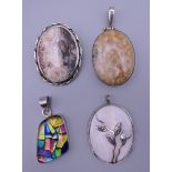 Three silver and hardstone pendants, together with a mosaic effect glass and silver pendant.