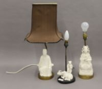 Three Chinese blanc de chine mounted lamps. The largest 55.5 cm high overall.
