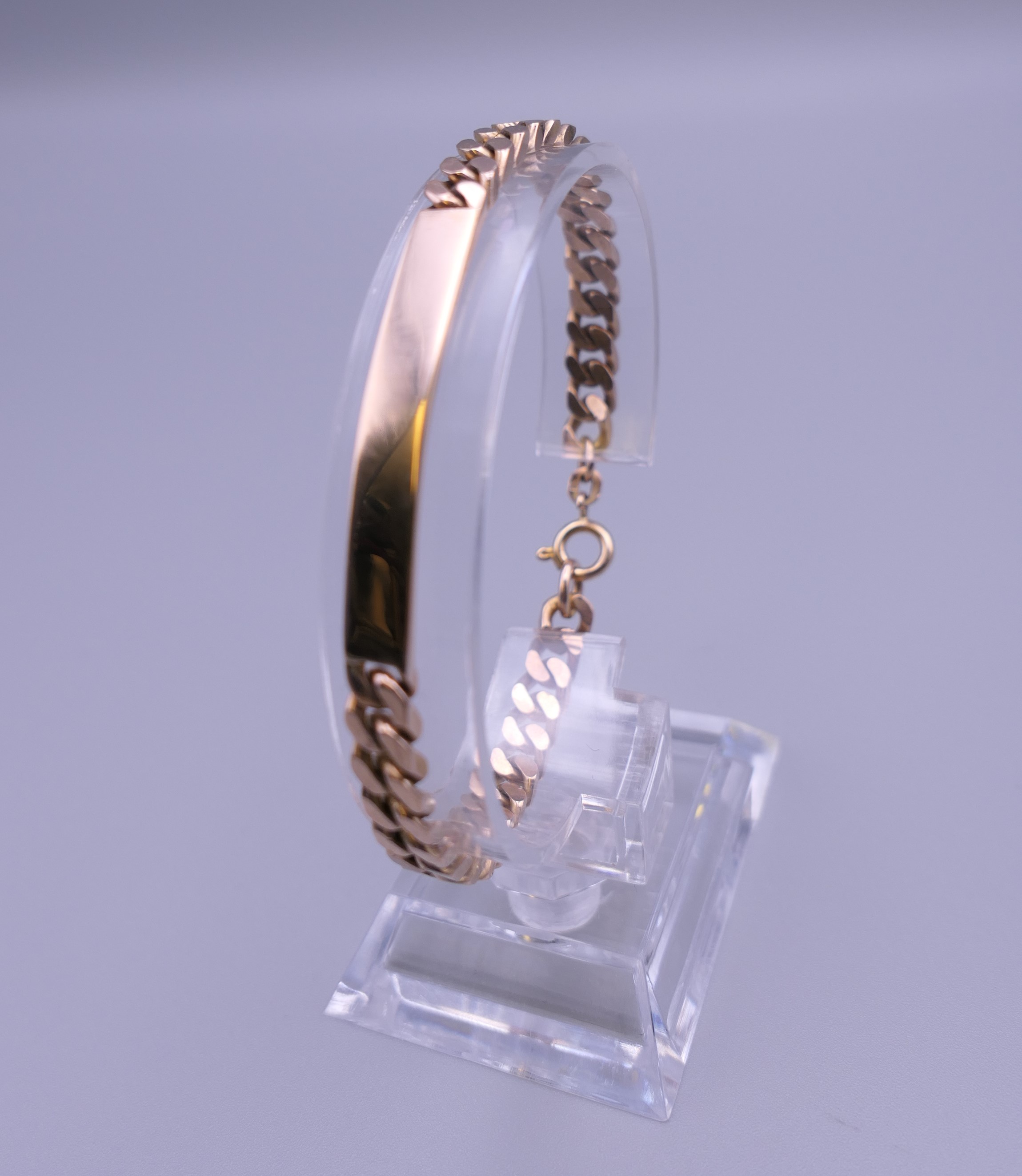 A 9 ct rose gold ID bracelet. 16 grammes. 18.5 cm long.