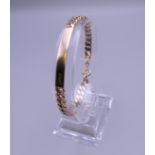 A 9 ct rose gold ID bracelet. 16 grammes. 18.5 cm long.