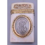 An unmarked 18 ct gold mounted ivory aide memoir. 8.75 cm high.