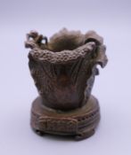 A small bronze censer in the form of a flower. 5 cm high.