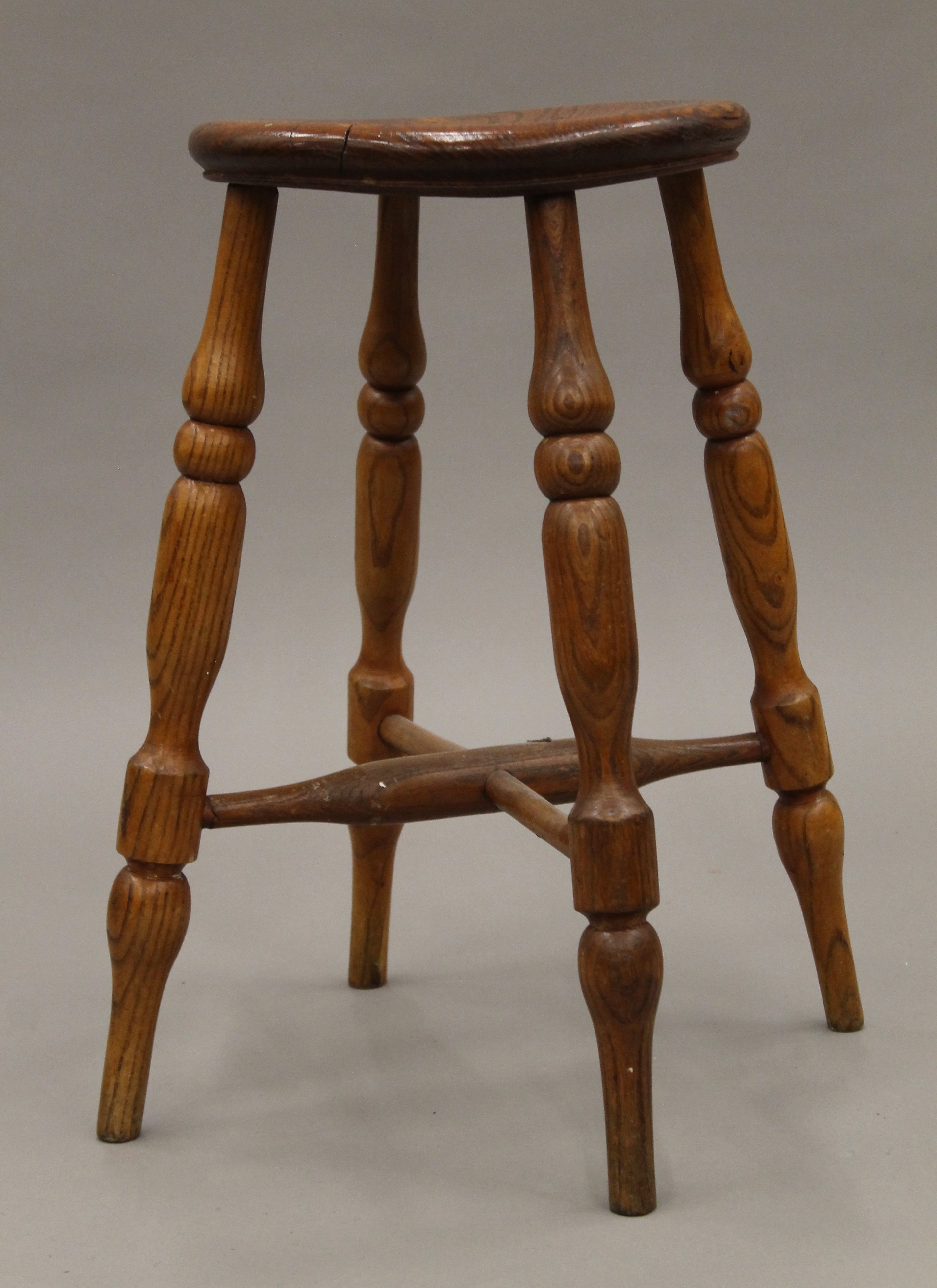 An elm stool. 52 cm high. - Image 2 of 2