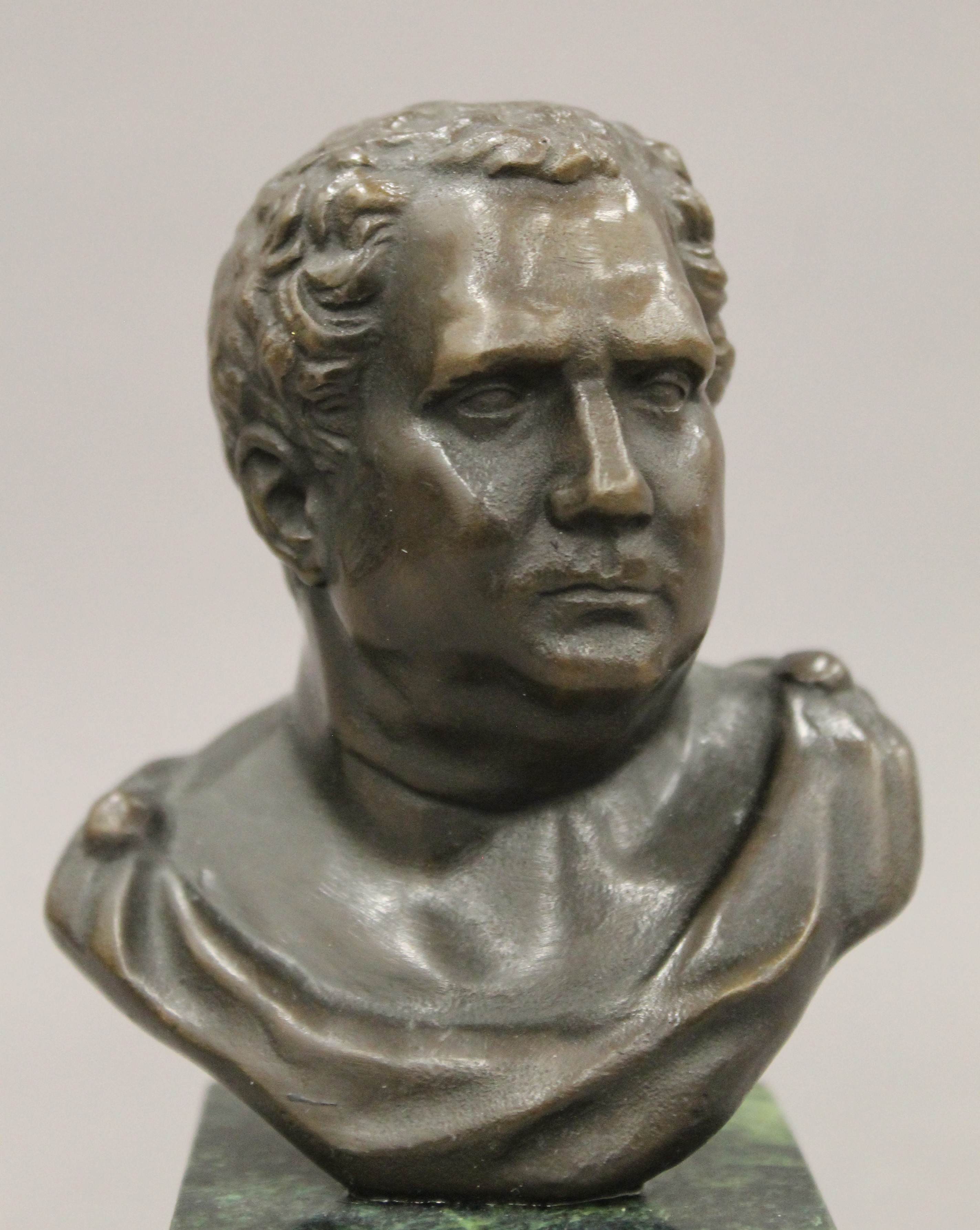 A small bronze bust of a classical figure. 14 cm high. - Image 2 of 4