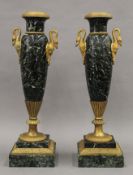 Two green marble vases with ormolu mounts. Each 39 cm high.