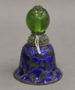 A Mandarin cap finial on white metal and blue enamel bell. 9 cm high.