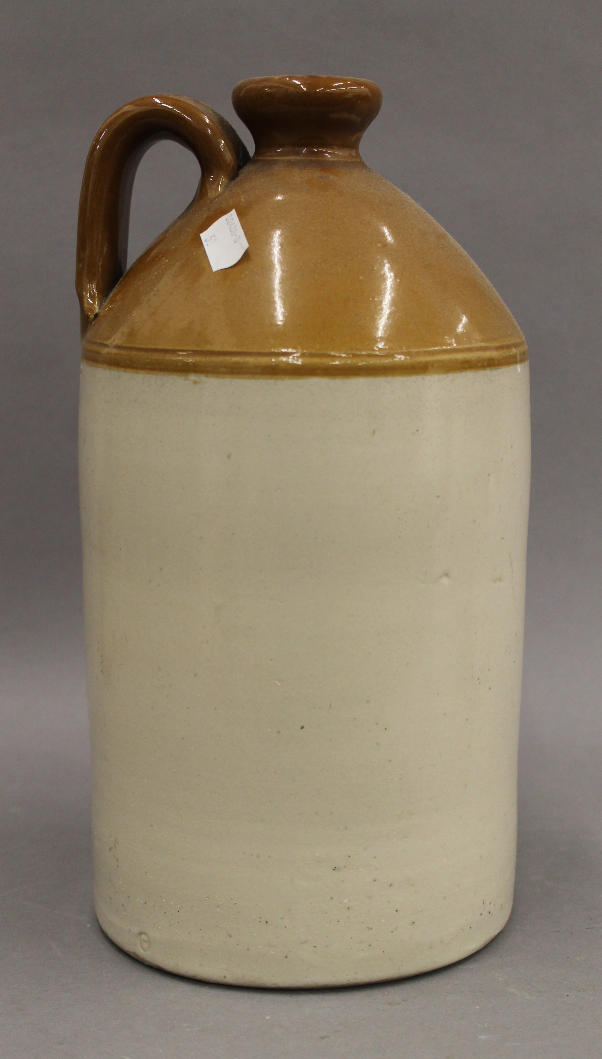 A Victorian stoneware flagon and two hot water bottles. The former 33 cm high. - Image 6 of 13